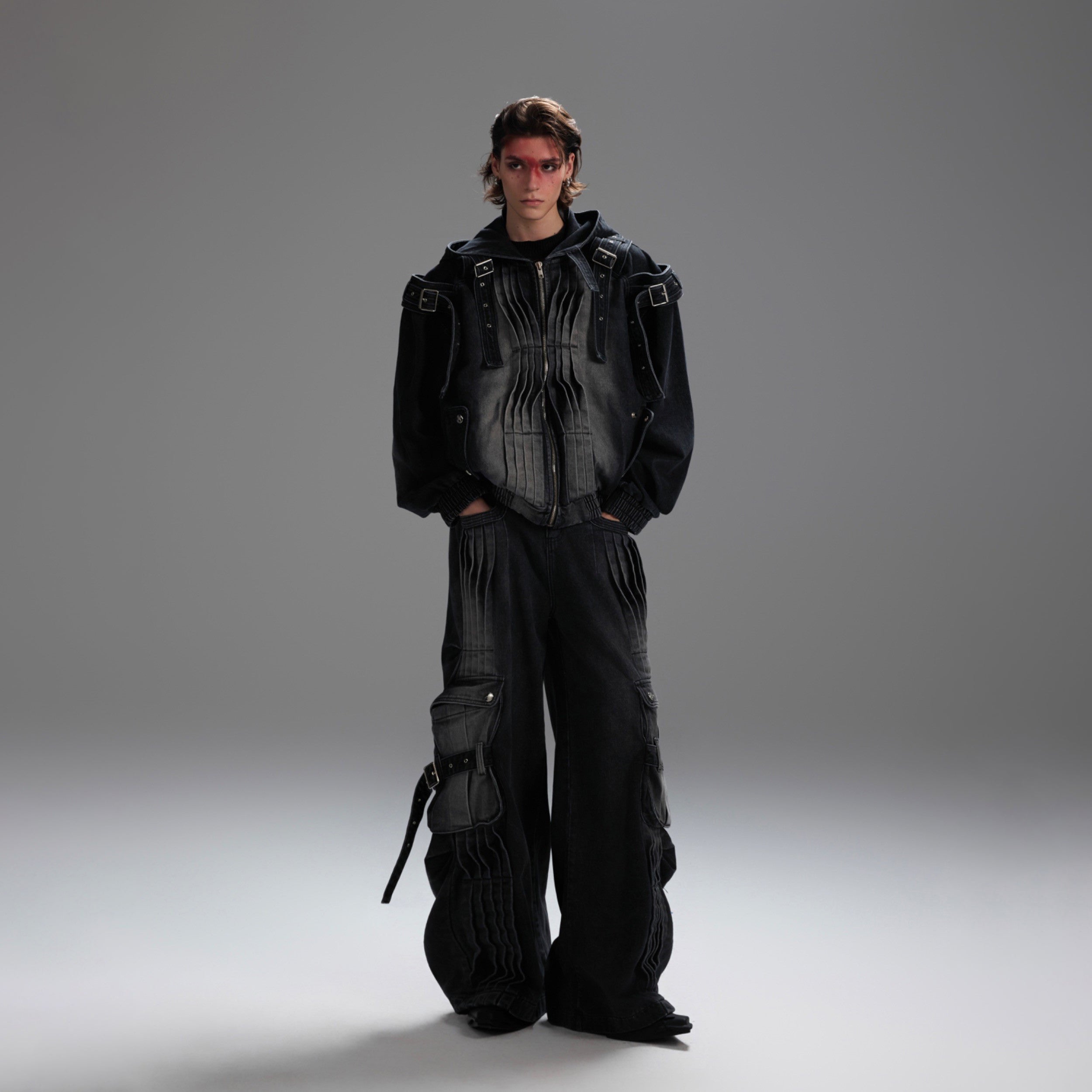 Side angle showcasing the jacket's oversized pockets and raw edge detailing on the sleeves