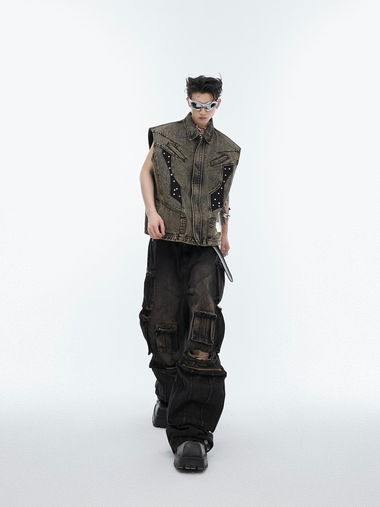 Side angle showing the unique asymmetrical cut of this deconstructed denim vest