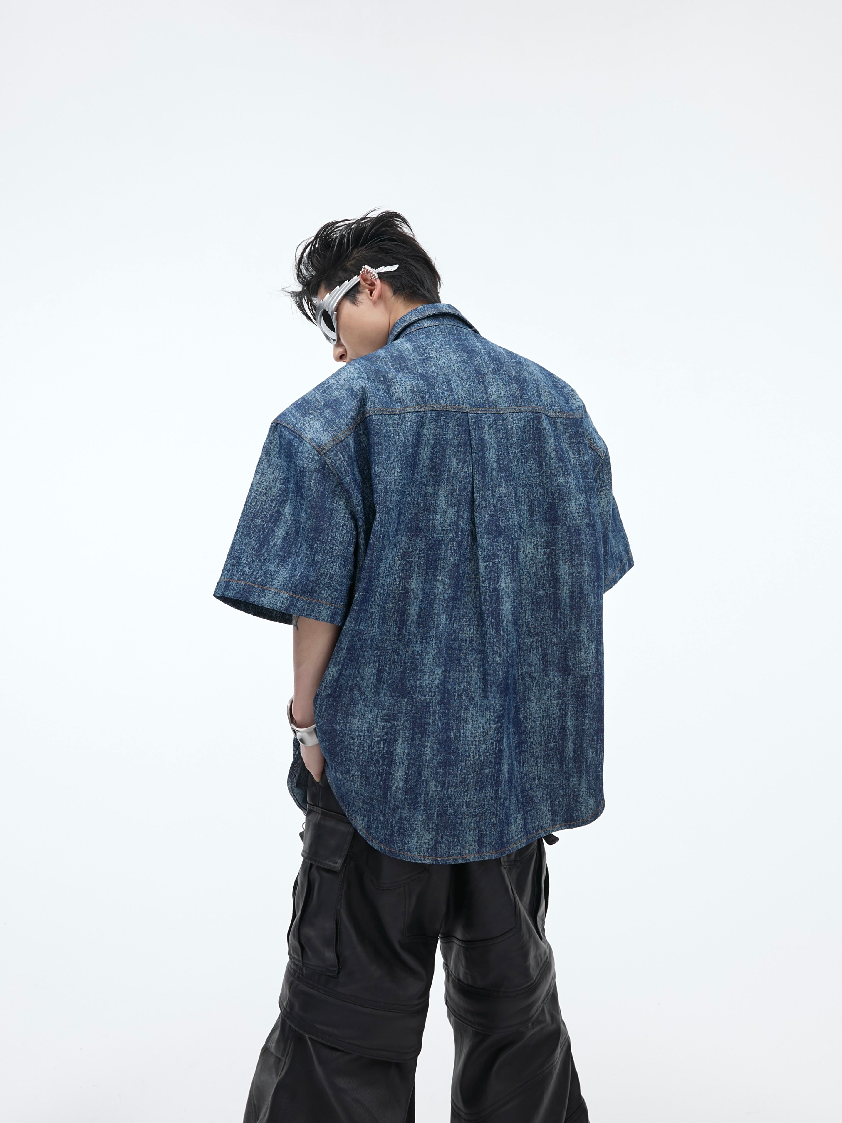 Back view showing the unique distressed pattern and contemporary cut of this premium streetwear polo
