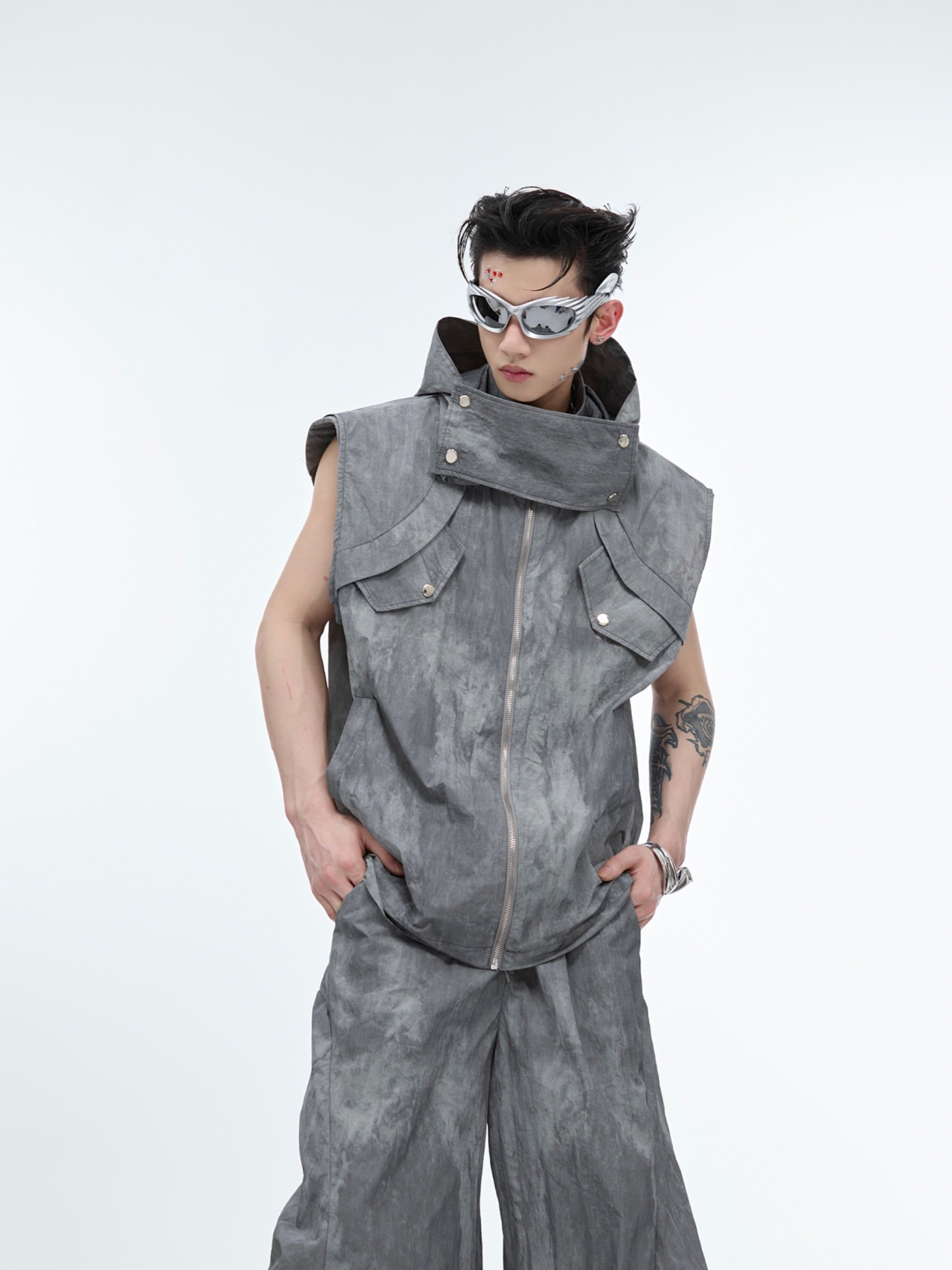 Stylish distressed vest featuring urban utility pockets and intentional destruction details