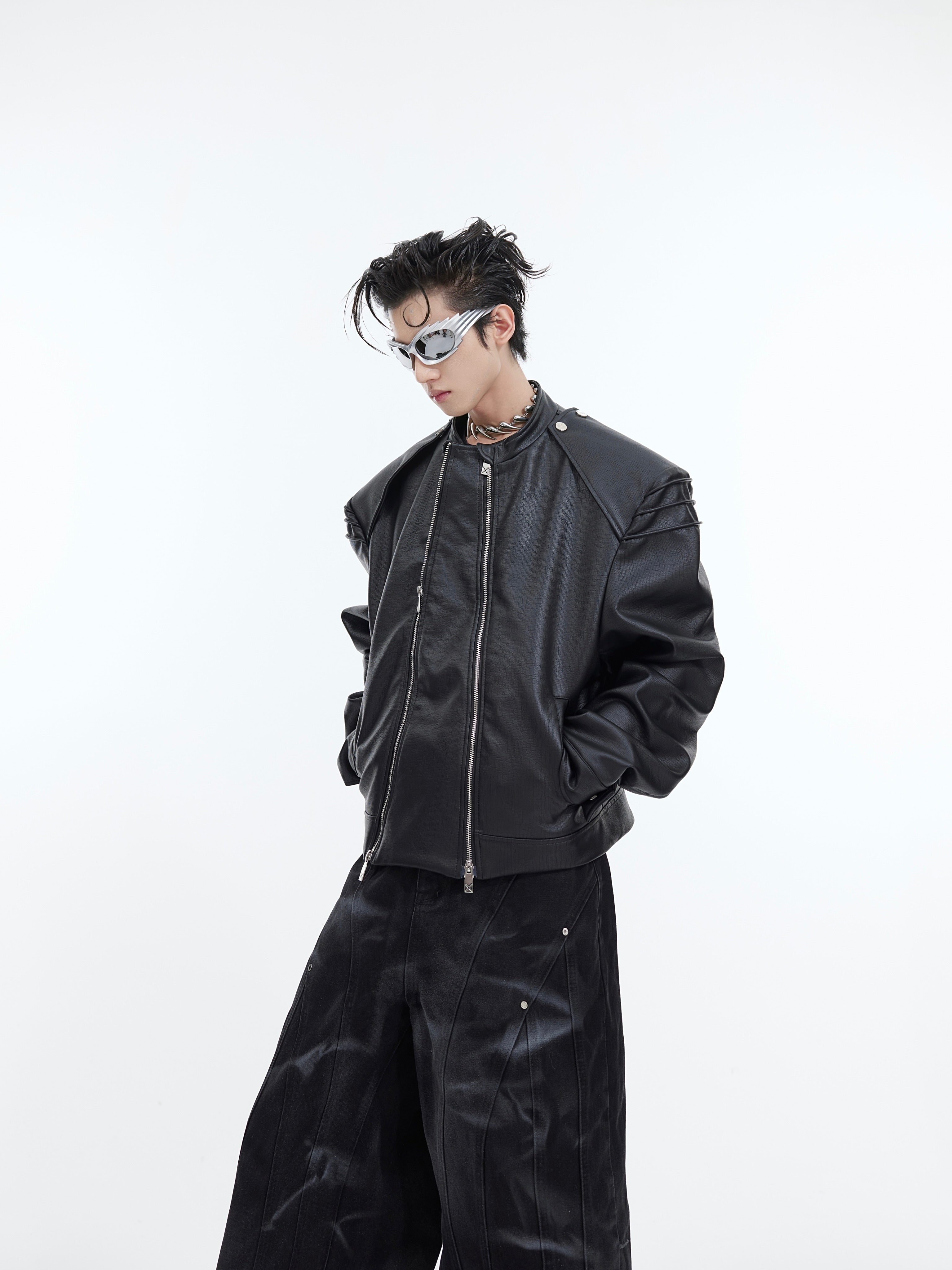 Side profile view of double zip leather jacket highlighting its deconstructed silhouette and edgy design
