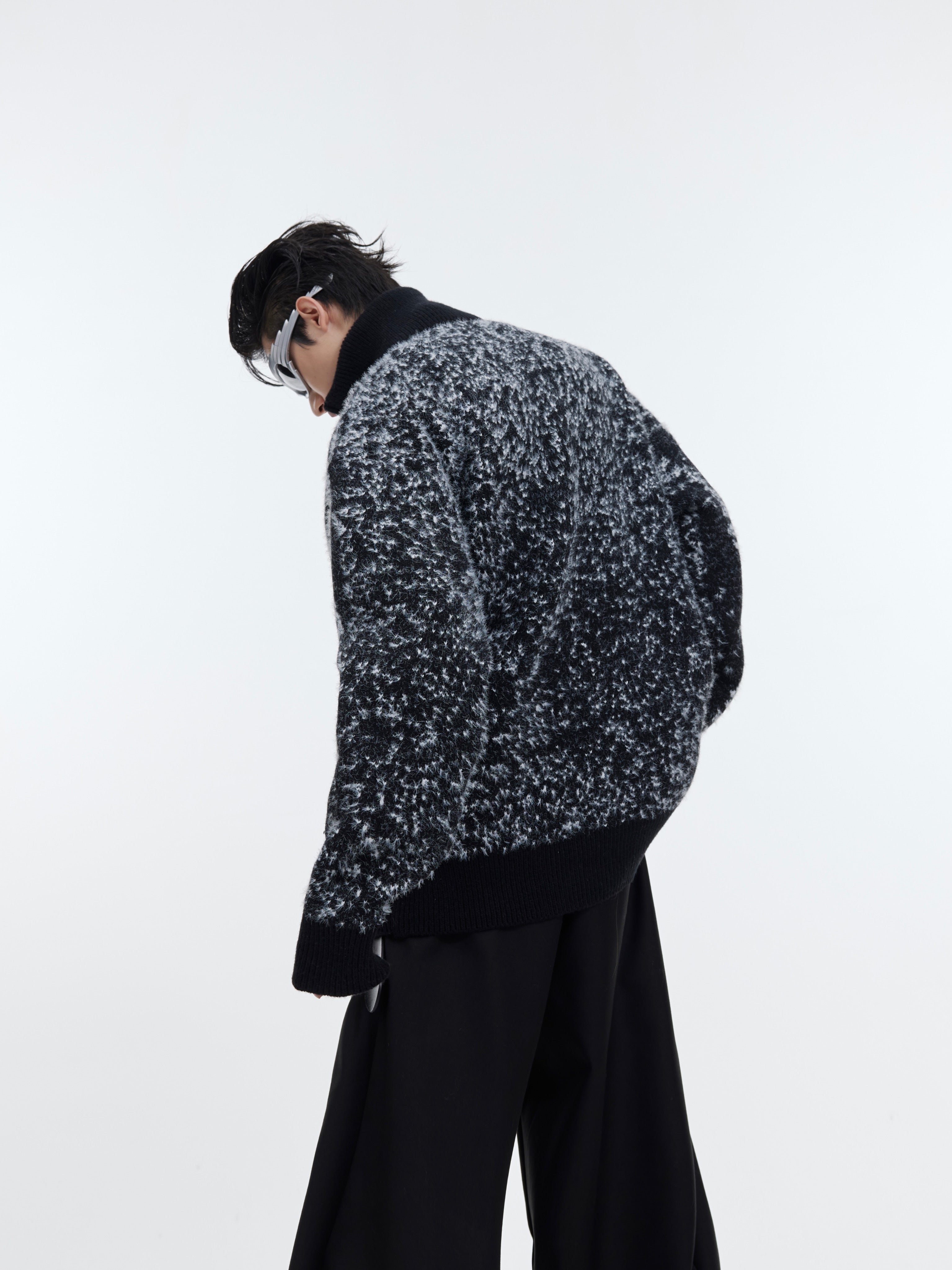 Side view of trendy dragon year knit sweater showing the oversized silhouette and premium acrylic-polyester blend fabric