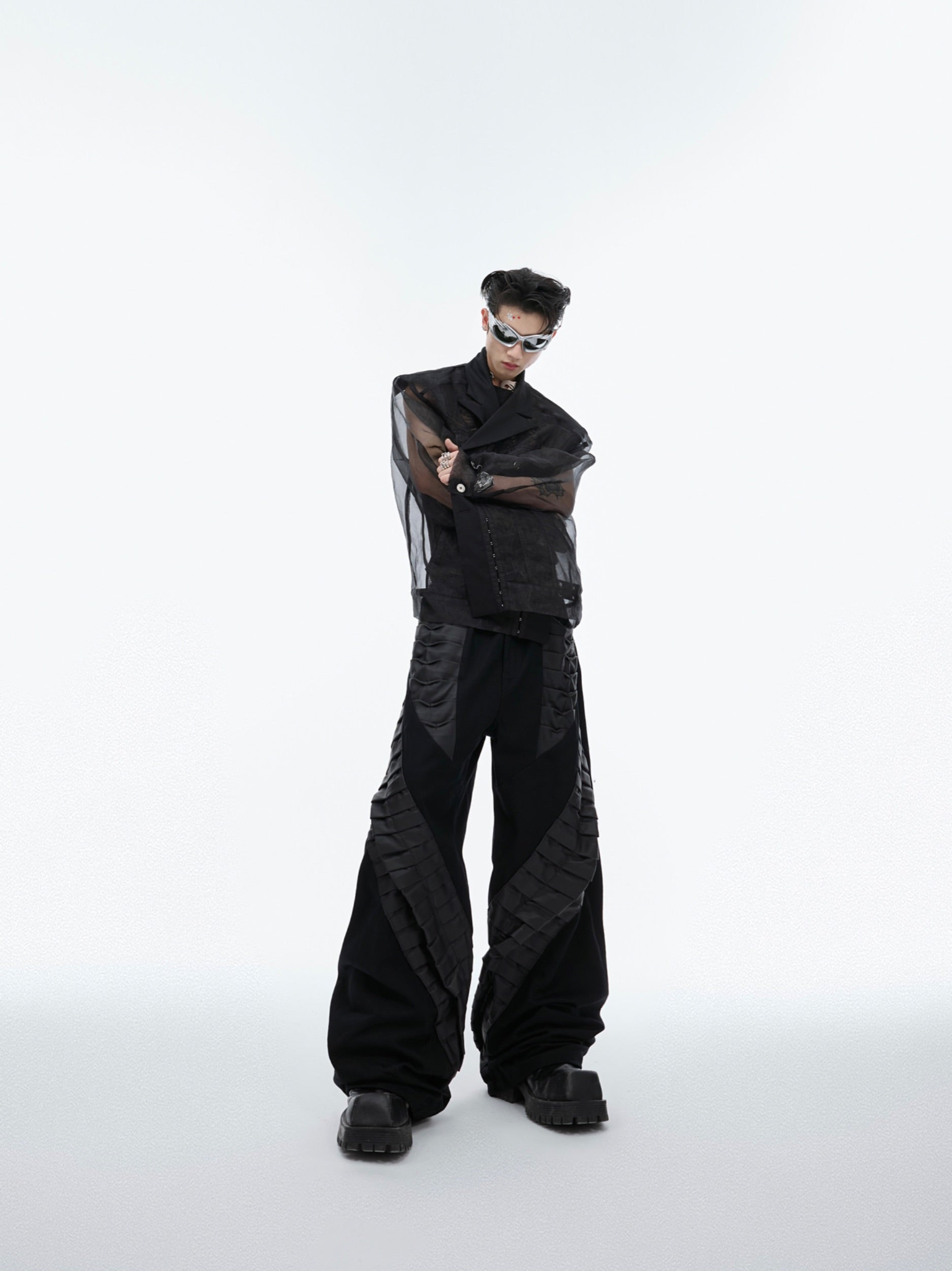 Close-up detail of sustainable cotton fabric in these statement cargo pants with drop-crotch design