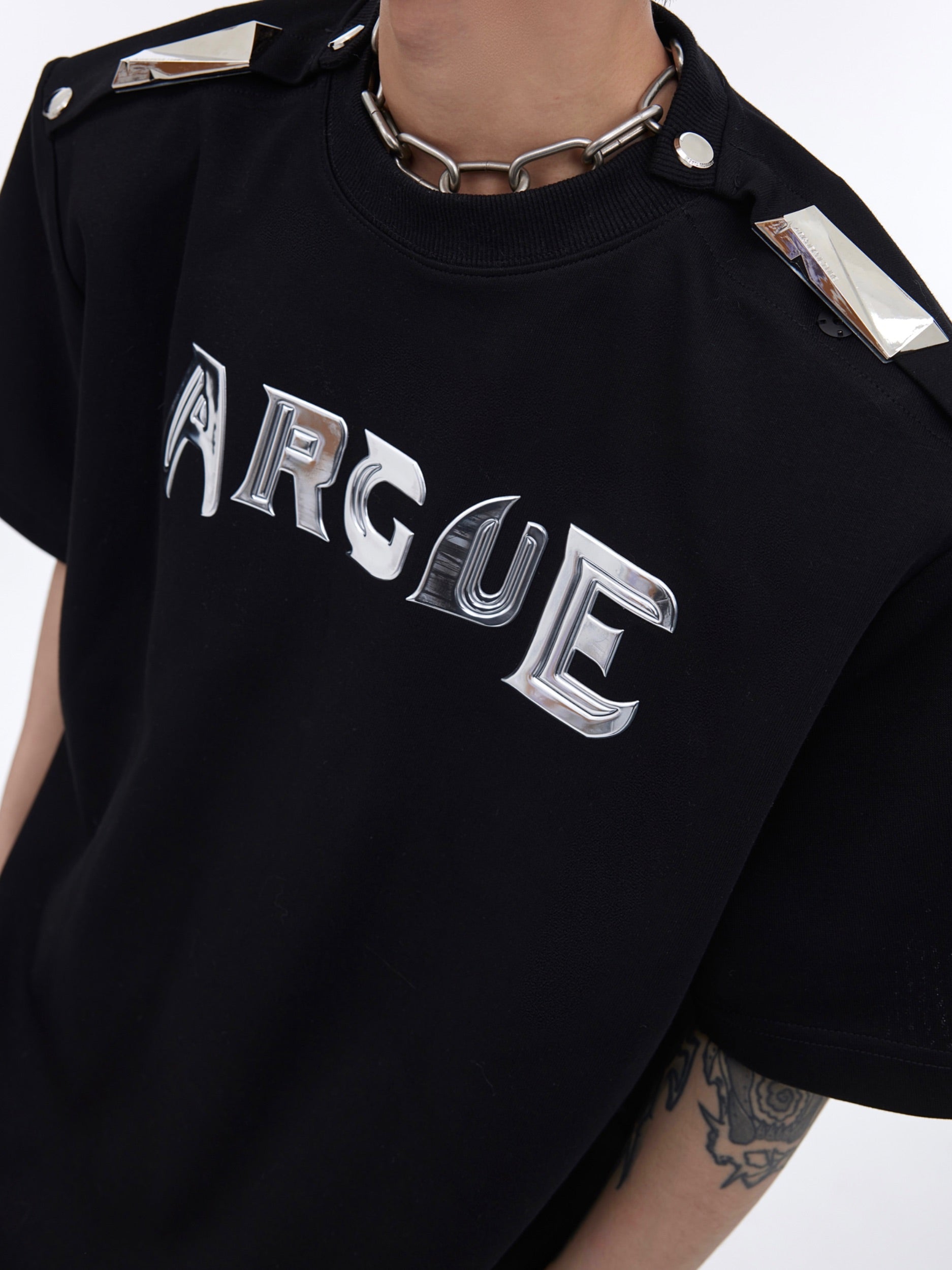 Back view of color-block off-shoulder tee showcasing the unique reconstructed design elements