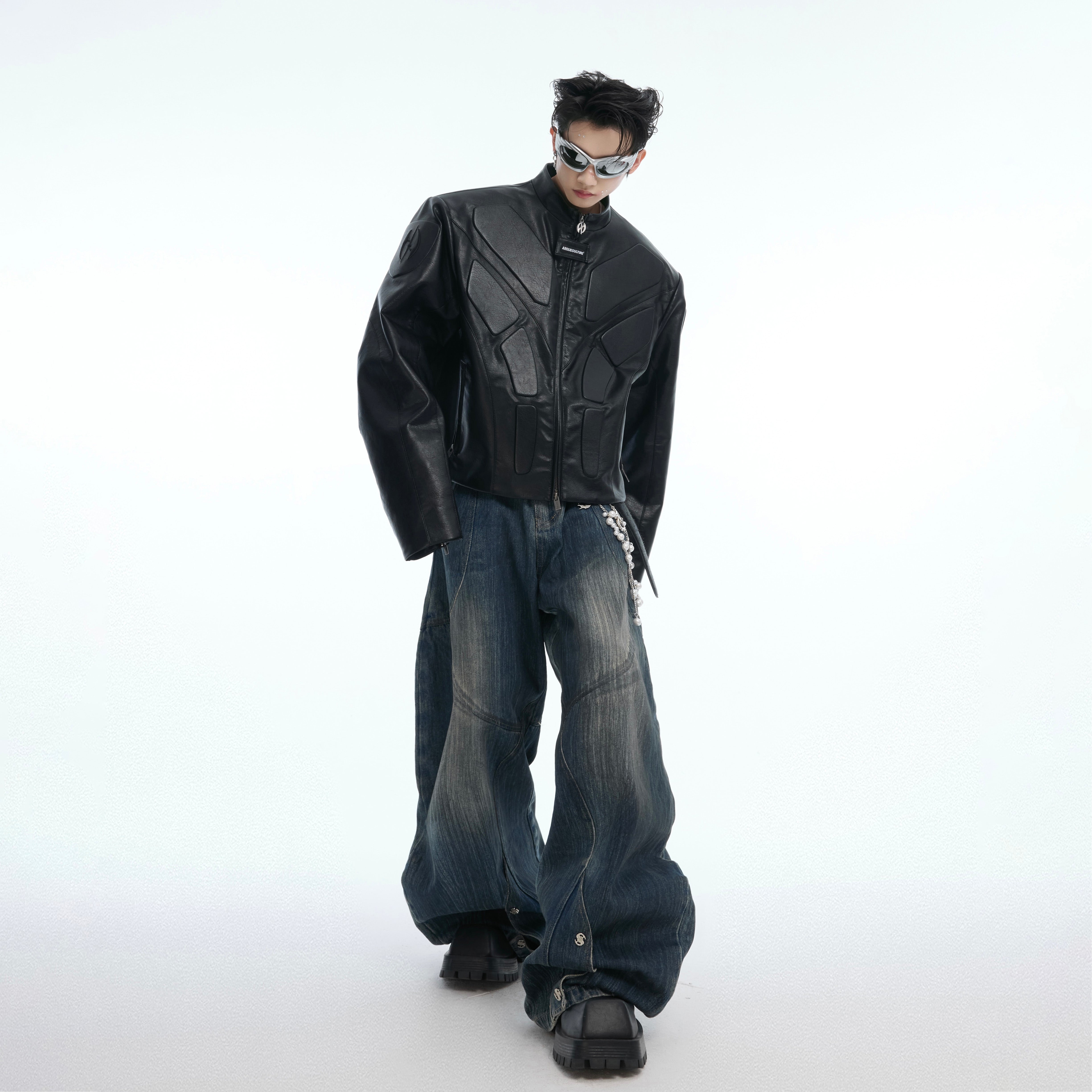 Back view of statement jacket showing distressed details and sci-fi futurism streetwear elements