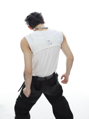 Close-up of the innovative metal buckle detail on this fashion-forward deconstructed tank top
