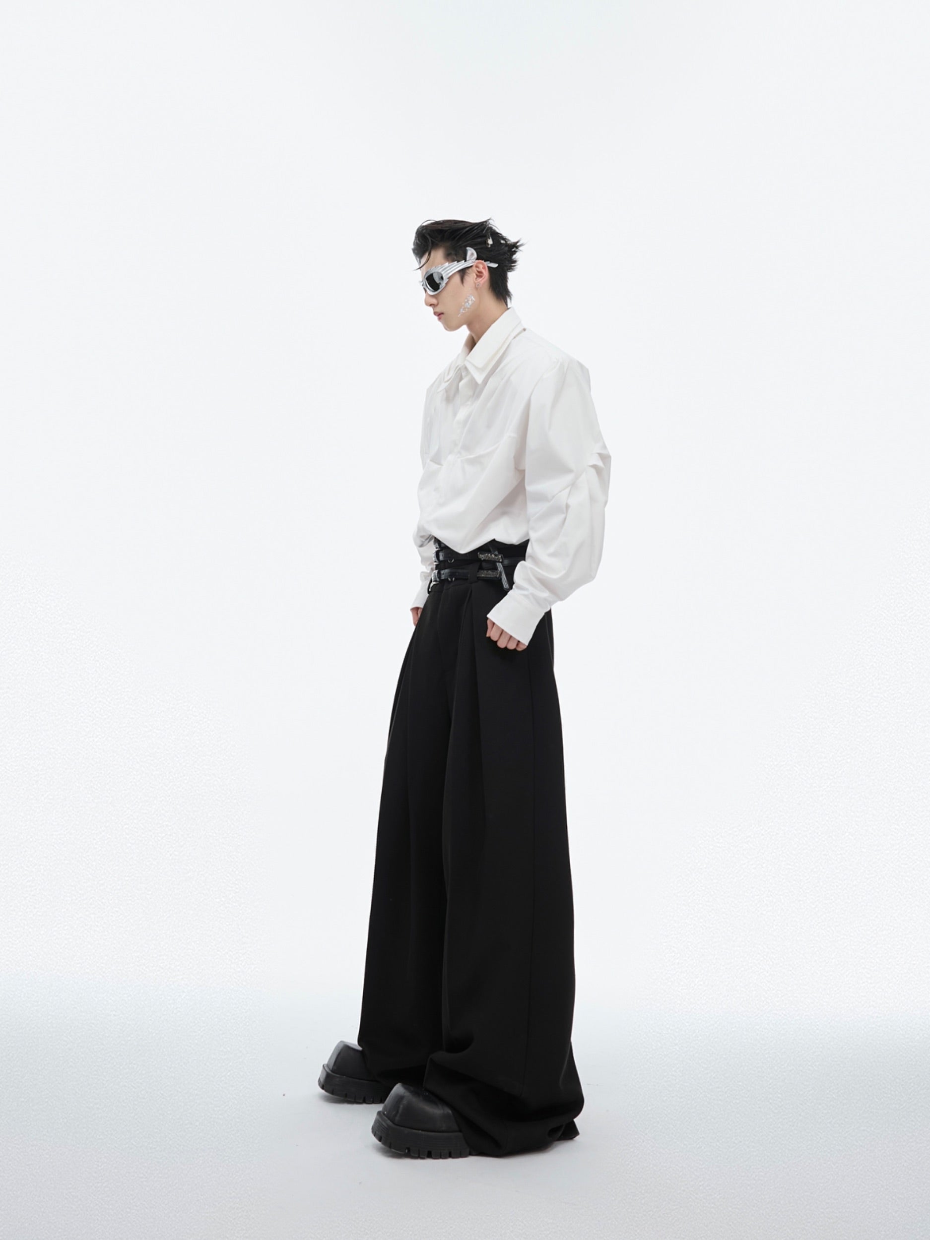 Back view showing contemporary layered hem design of this fashion-forward oversized shirt