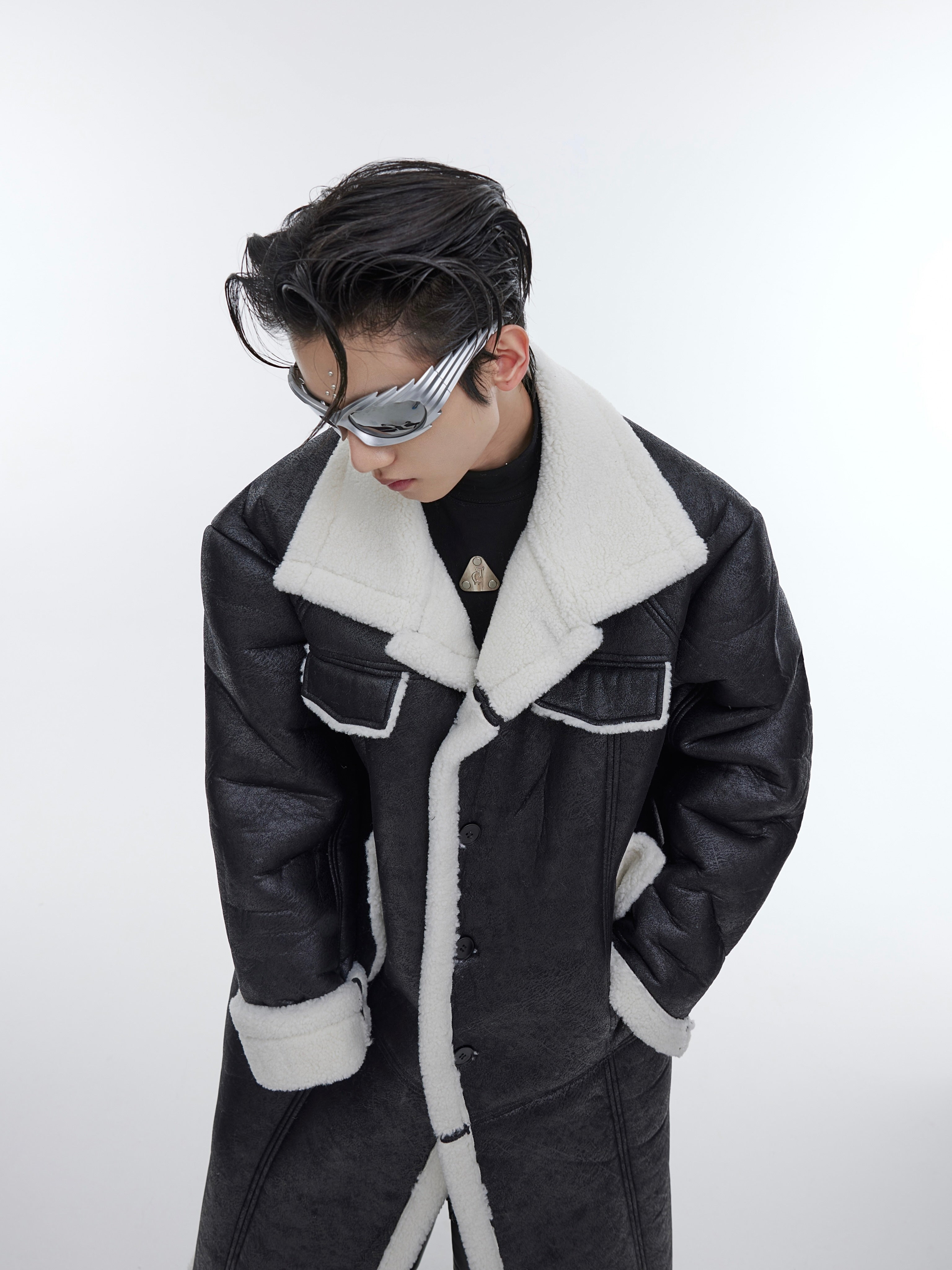Side view of the patchwork shearling jacket demonstrating how to style this urban statement piece