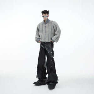 Side angle of luxurious silver knit sweater showing cropped length and fluffy turtleneck