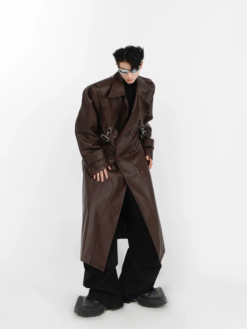 Edgy faux leather trench coat with bold shoulder pads and metal zippers for urban streetwear style