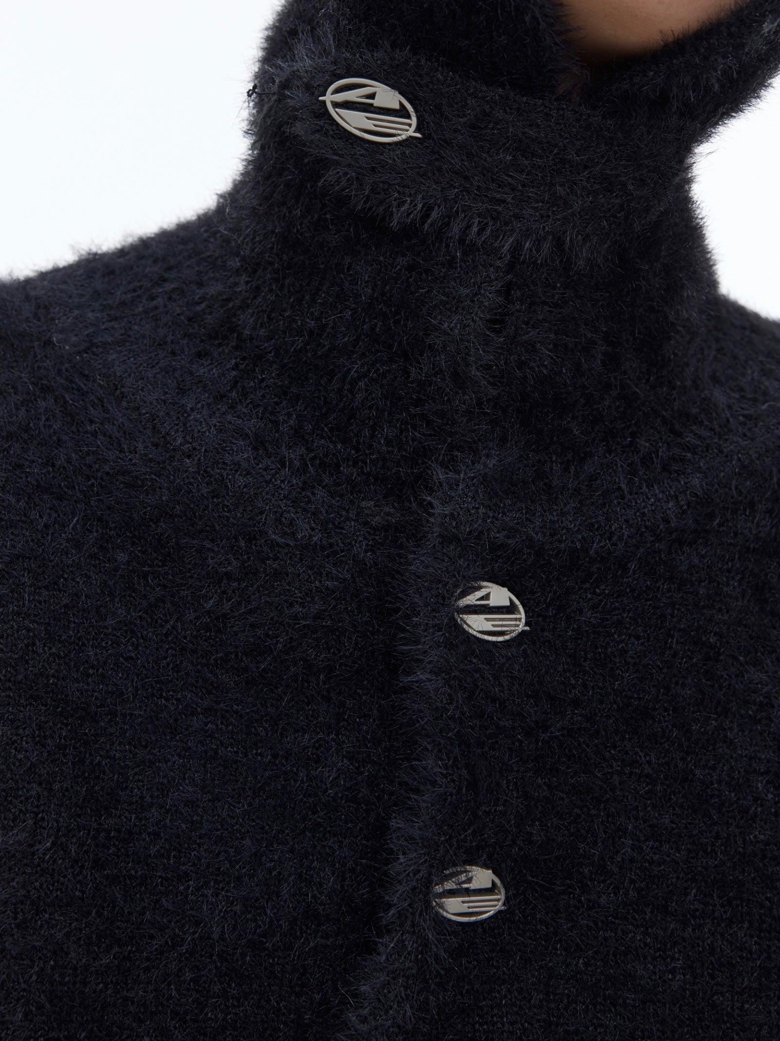 Artistic dye splash patterns on the sleeves of this warm oversized sweatshirt jacket