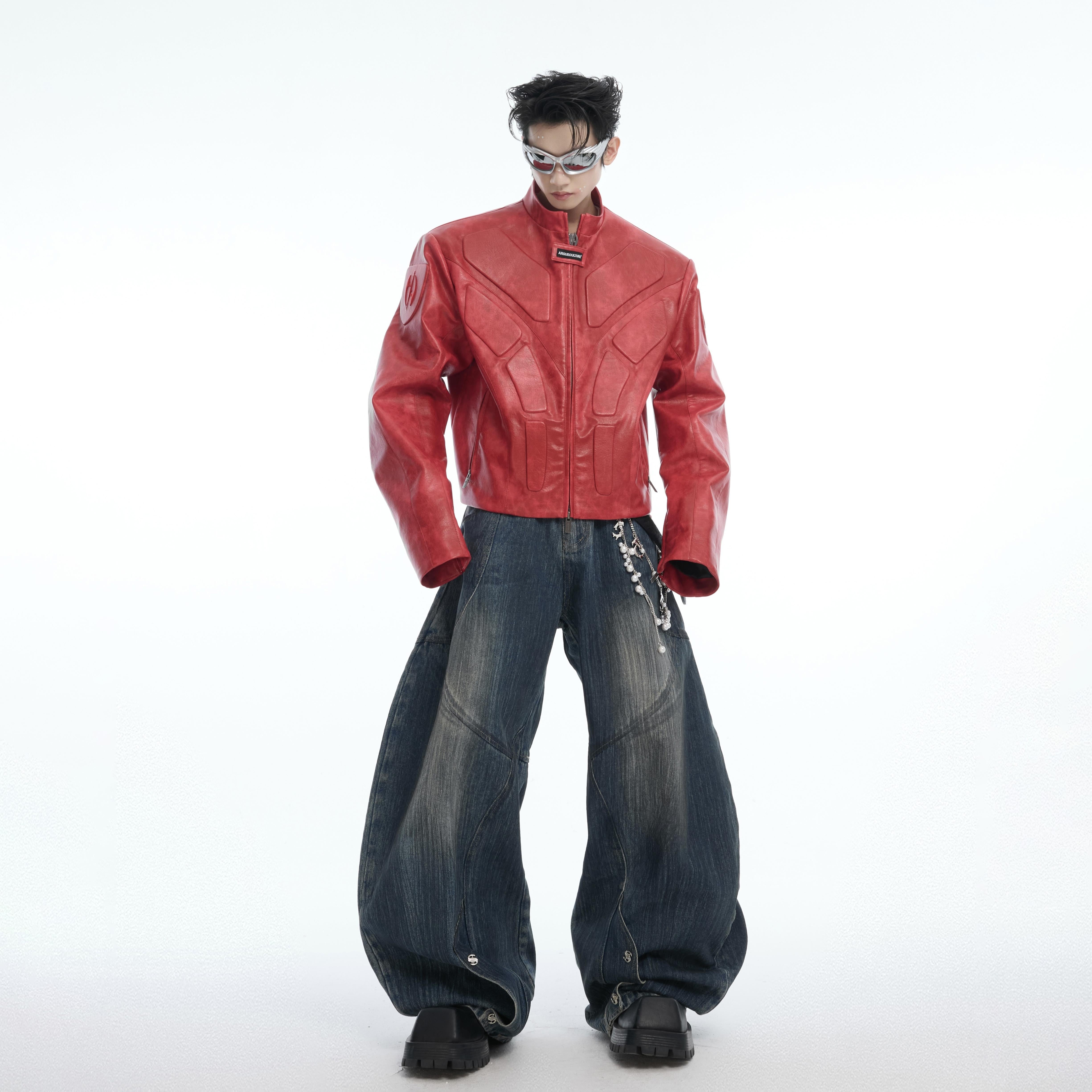 Detail shot of revolutionary 3D panel construction on avant-garde biker coat with stand collar