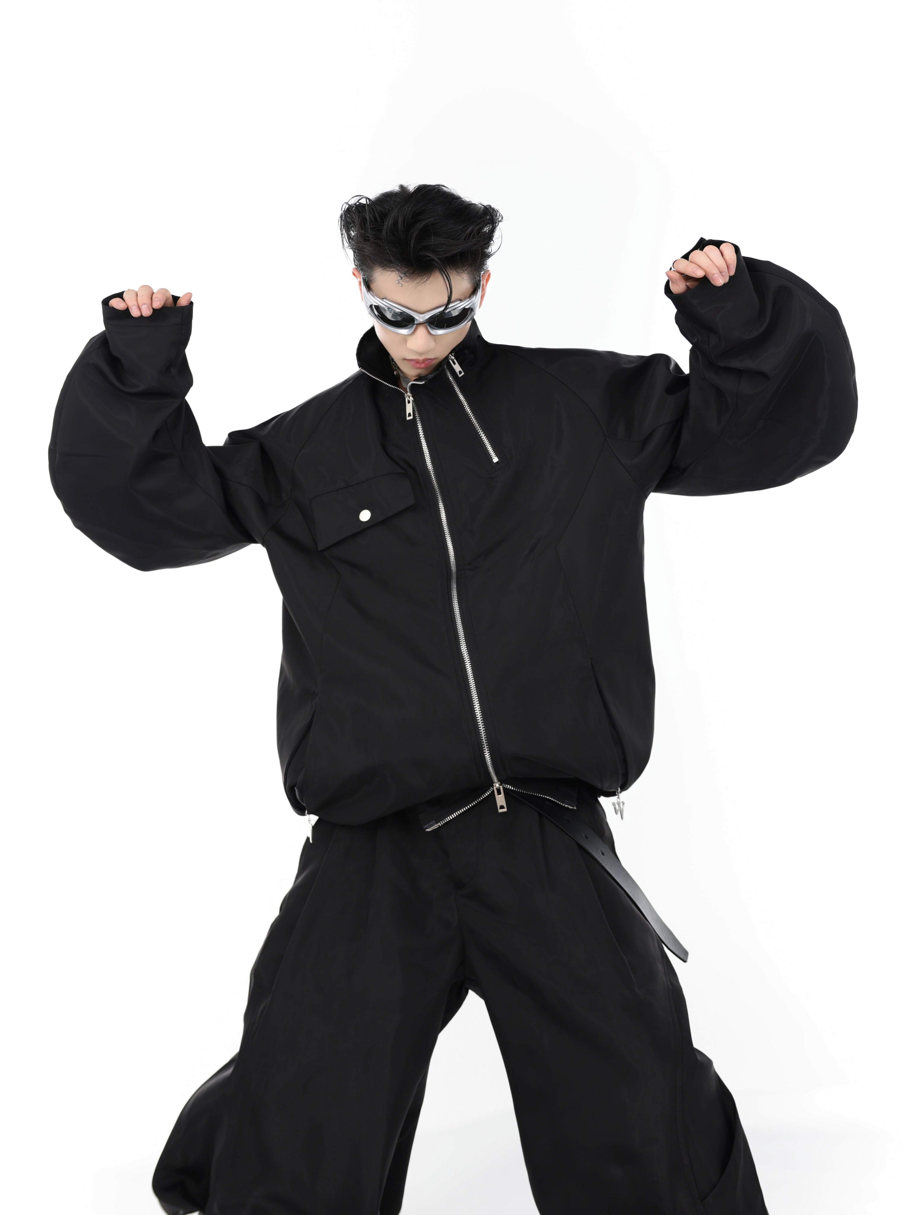 Closeup of premium metal zipper on avant-garde streetwear jacket with bold design elements
