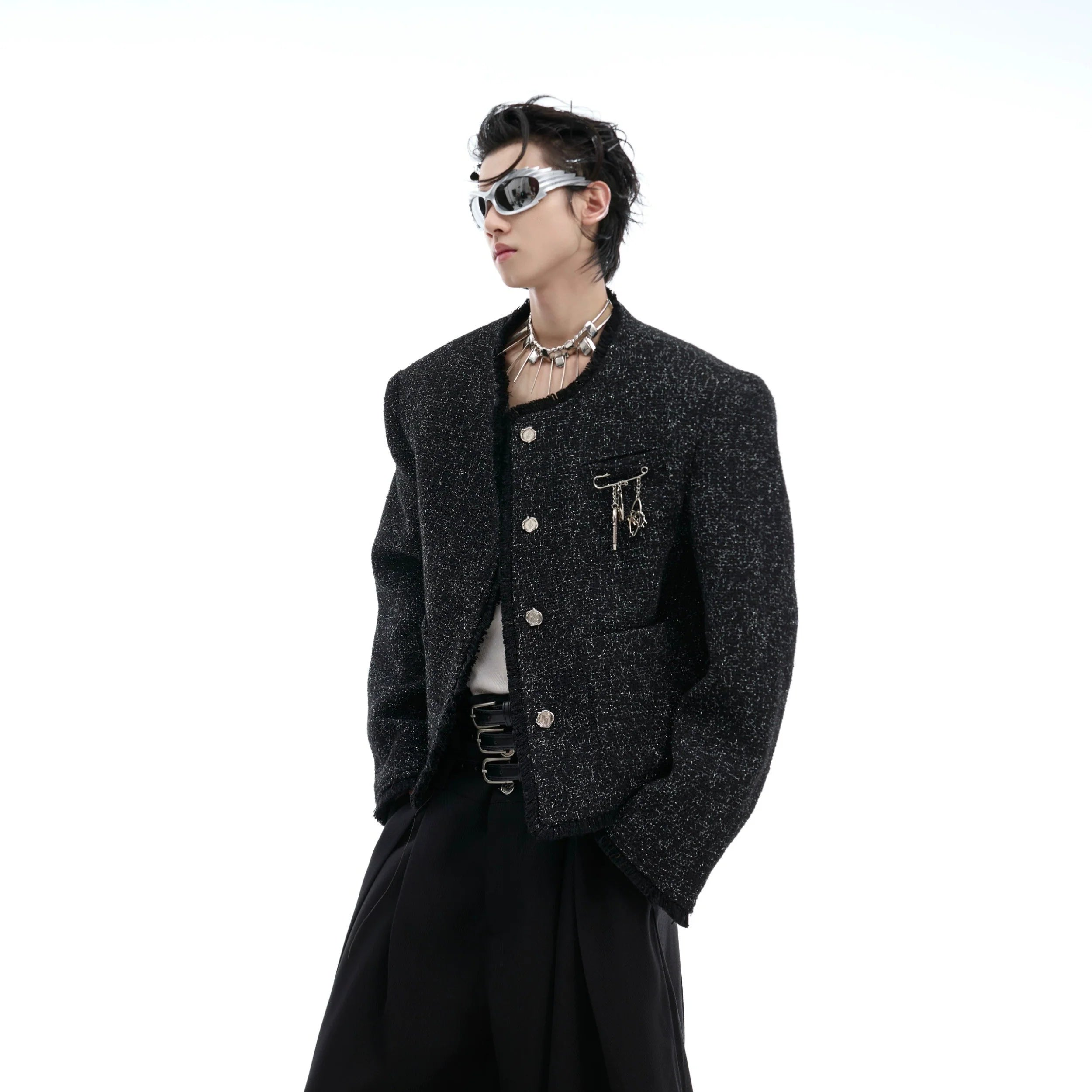 Slim-fit glossy textured jacket with unique quilted shoulder pads, showcasing contemporary streetwear style