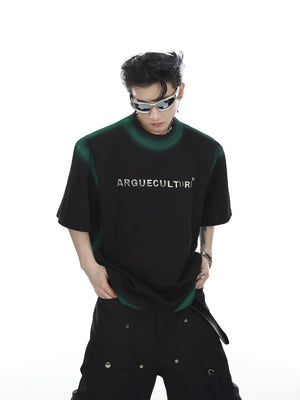 Close-up back detail of gradient metallic print on streetwear t-shirt with drop-shoulder silhouette