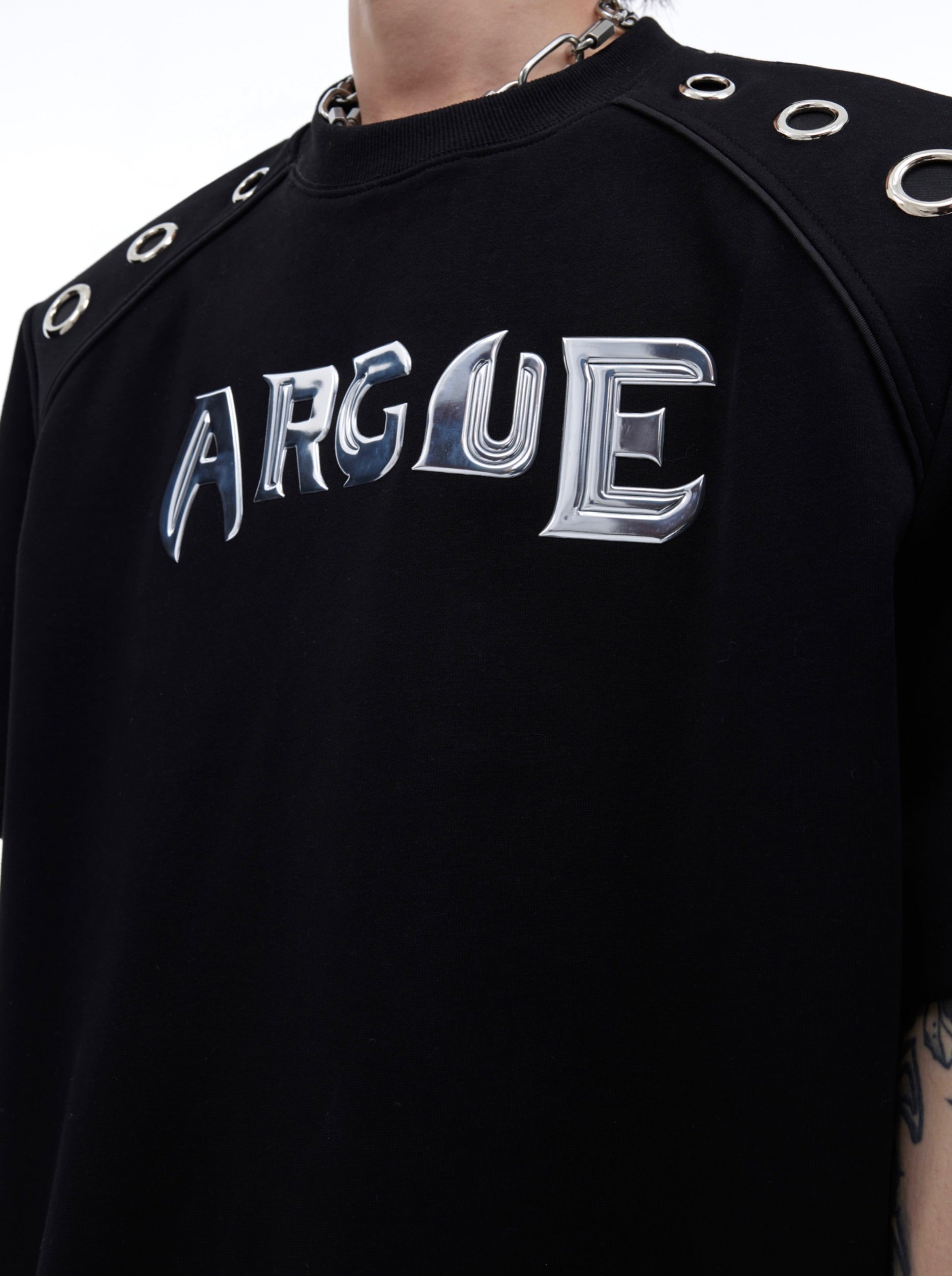 Close-up detail of the urban edge graphic logo on this high fashion statement tee