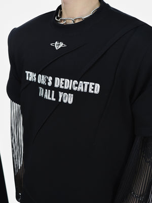 Back view of men's streetwear tee showcasing the full oversized fit and stylish metal graphic print design