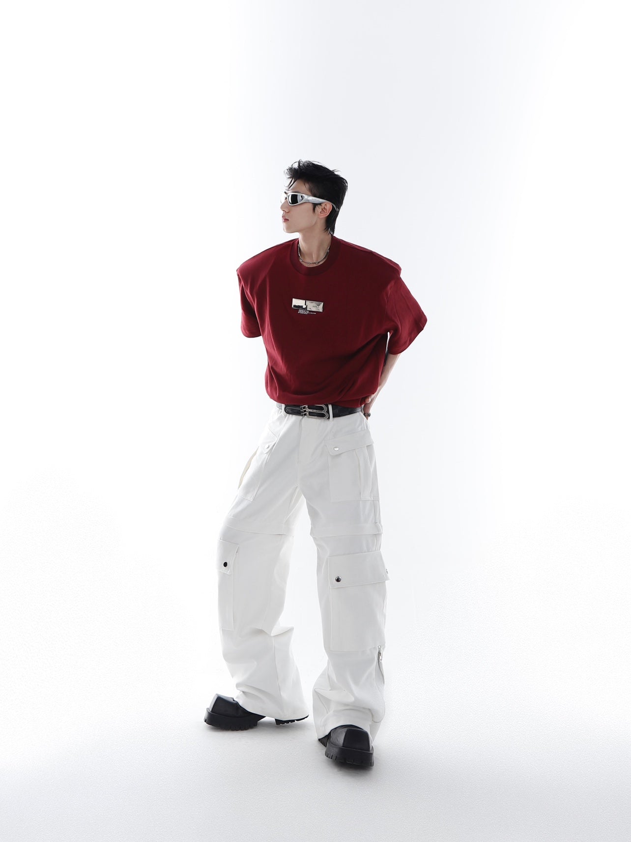 Back view showing the clean lines and architectural silhouette of this avant-garde summer streetwear tee