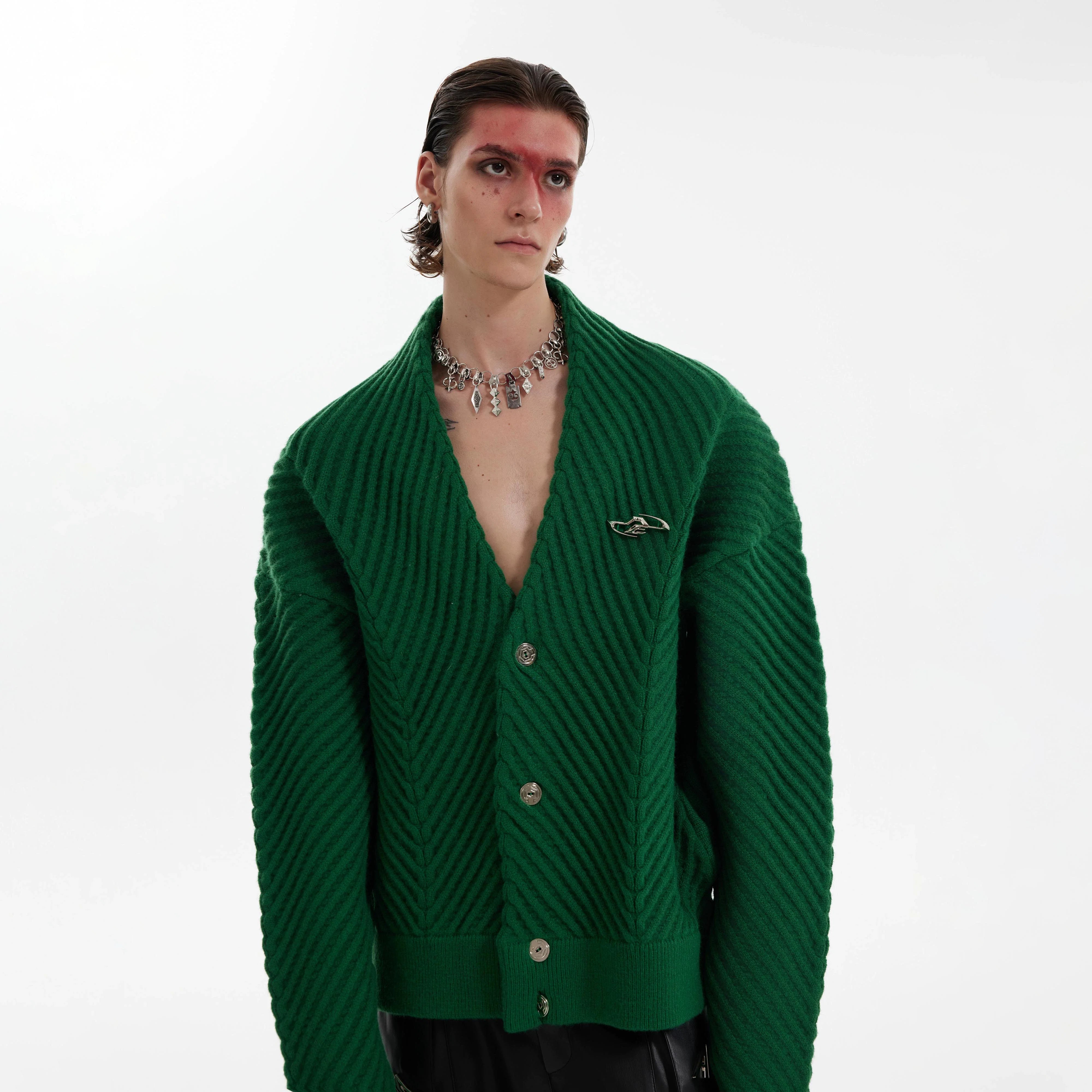 Heavyweight textured V-neck sweater with asymmetric design, perfect for streetwear fashion and layering in fall/winter