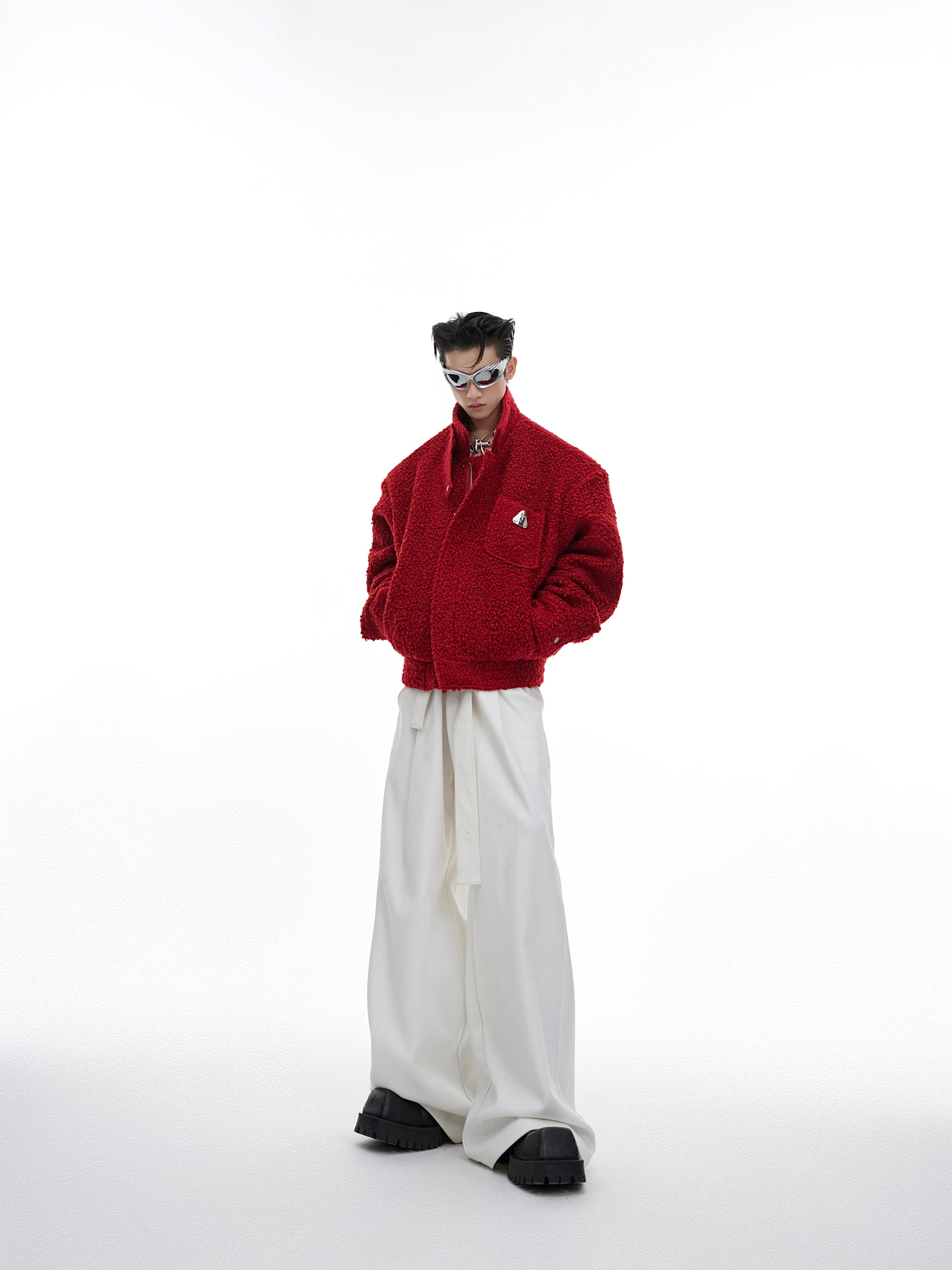 Stylish high-waist wide-leg trousers paired with urban outfit, showcasing premium streetwear fashion