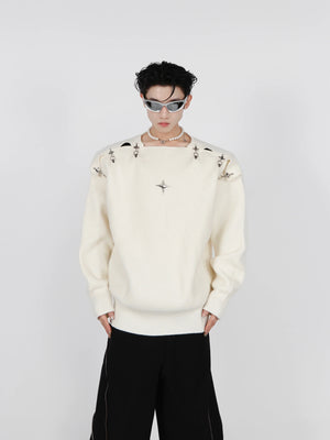 Trendy off-shoulder hollow-knit sweater with industrial metal buckle detailing for streetwear fashion