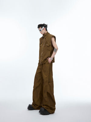 Close-up of unique ink-dye patterns on this avant-garde sleeveless cargo vest with raw edge finish