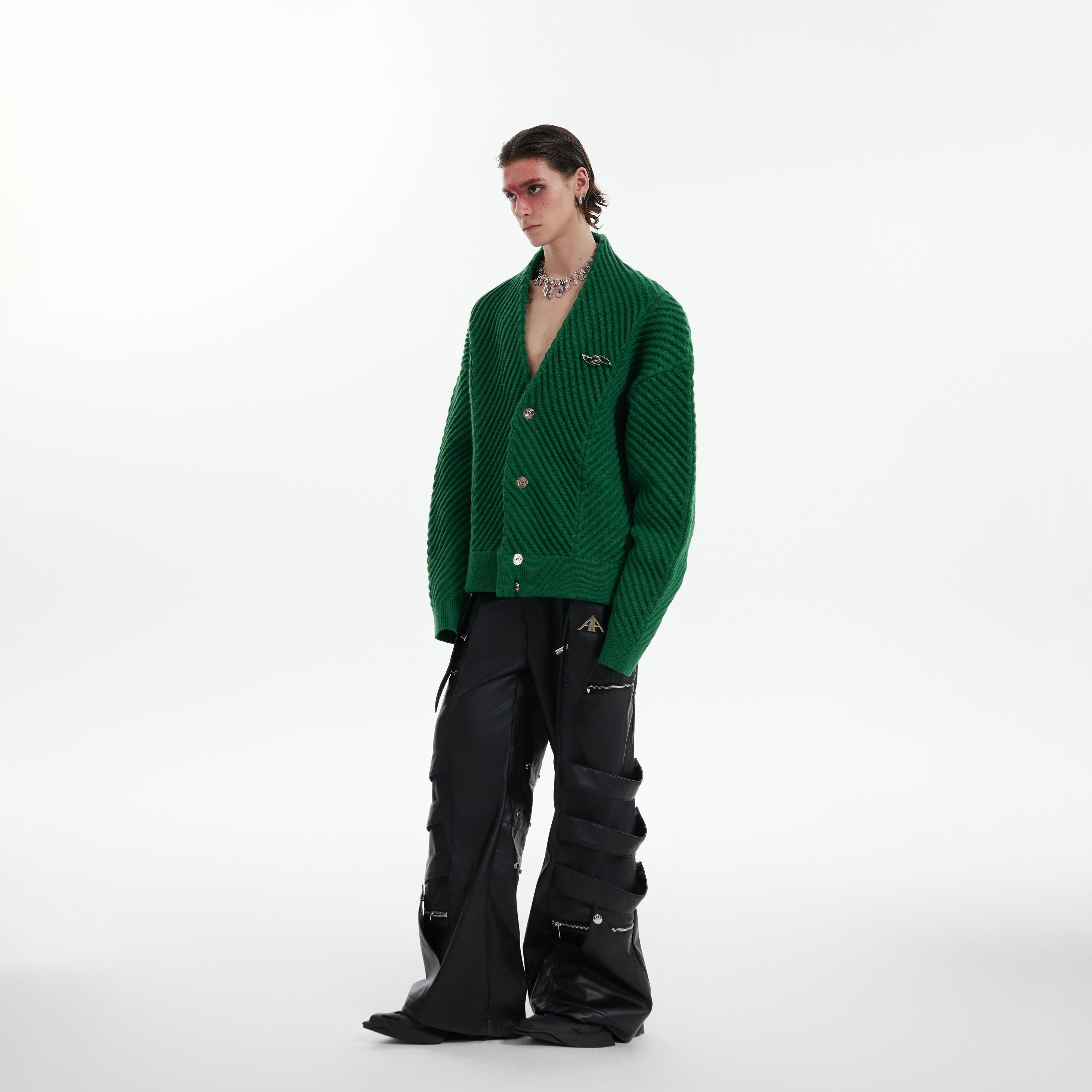 Detail shot showing the premium knit quality and loose fit of this v-neck pullover sweater