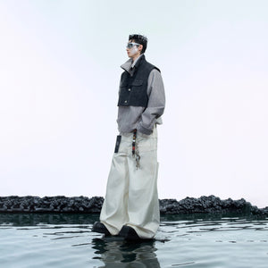 Deconstructed waistcoat jacket worn as layered streetwear piece with urban fashion aesthetic