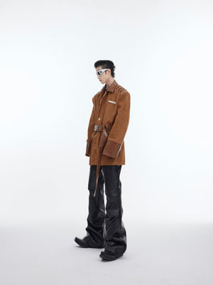 Back view of patchwork leather jacket showing unique deconstructed design and premium craftsmanship