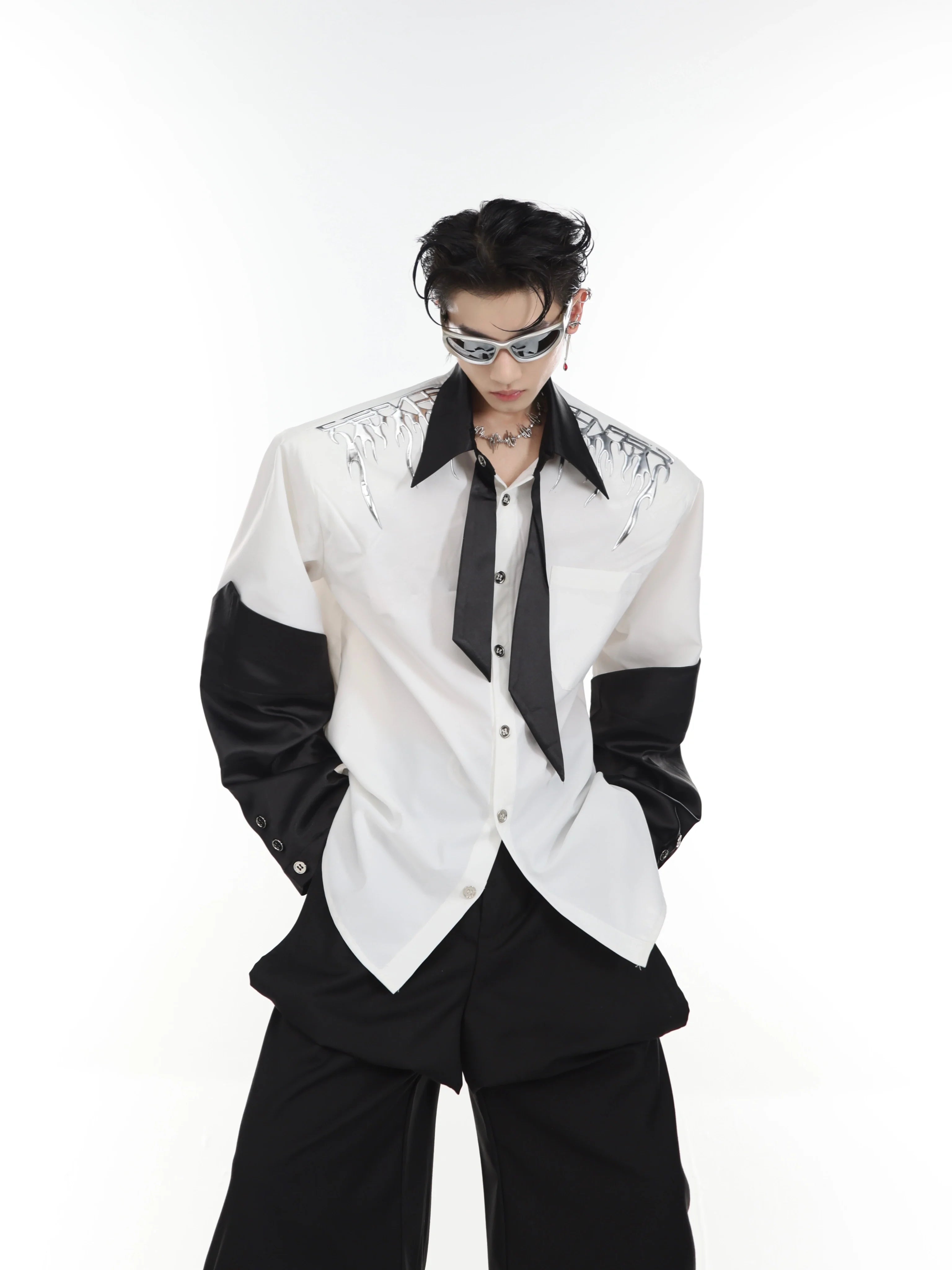 Liquid metal shoulder shirt with striking 3D metallic print, featuring oversized ice-knit fabric and open front design