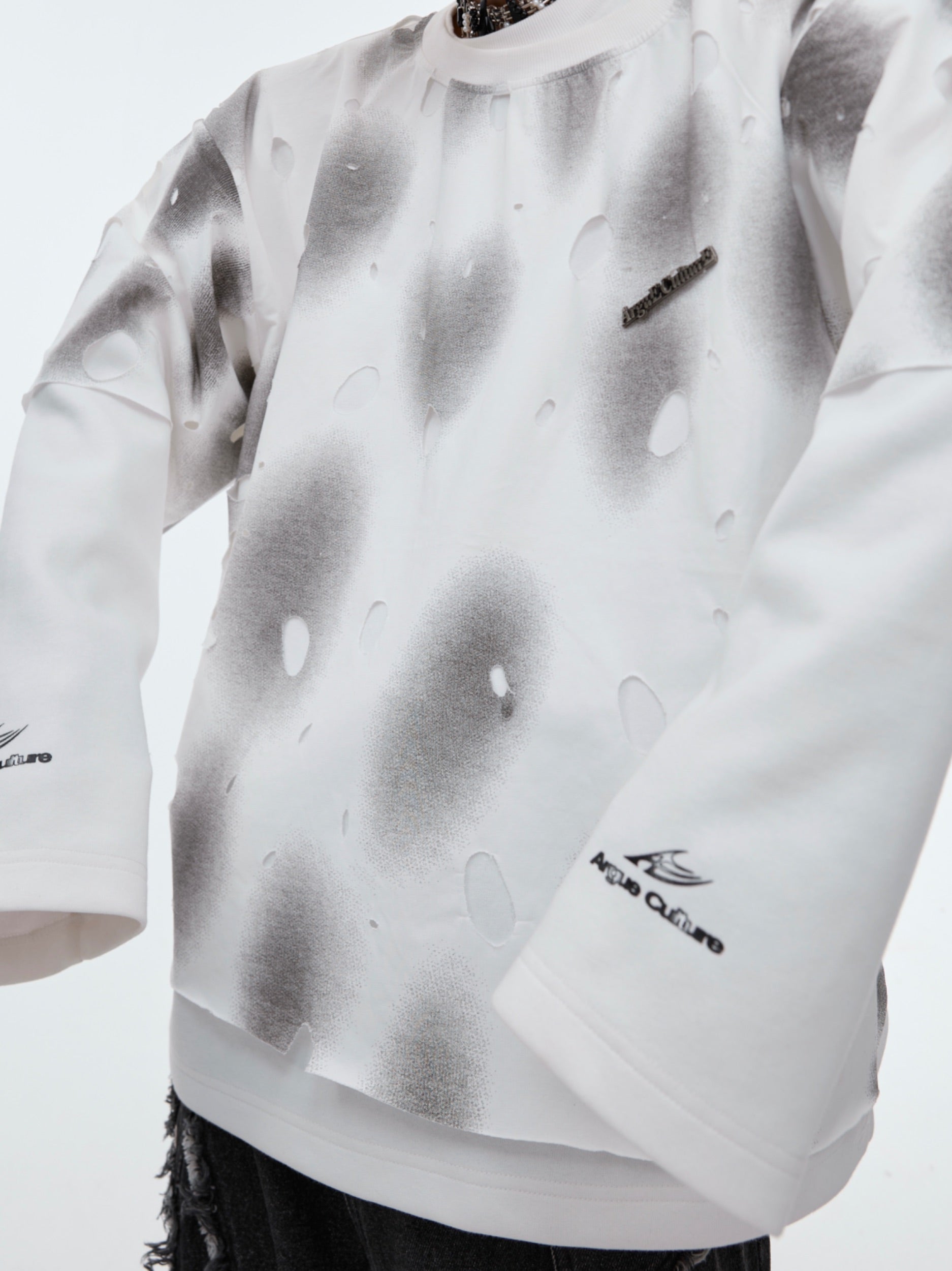 Side angle showing the innovative two-layer design and comfortable loose fit of this urban streetwear hoodie