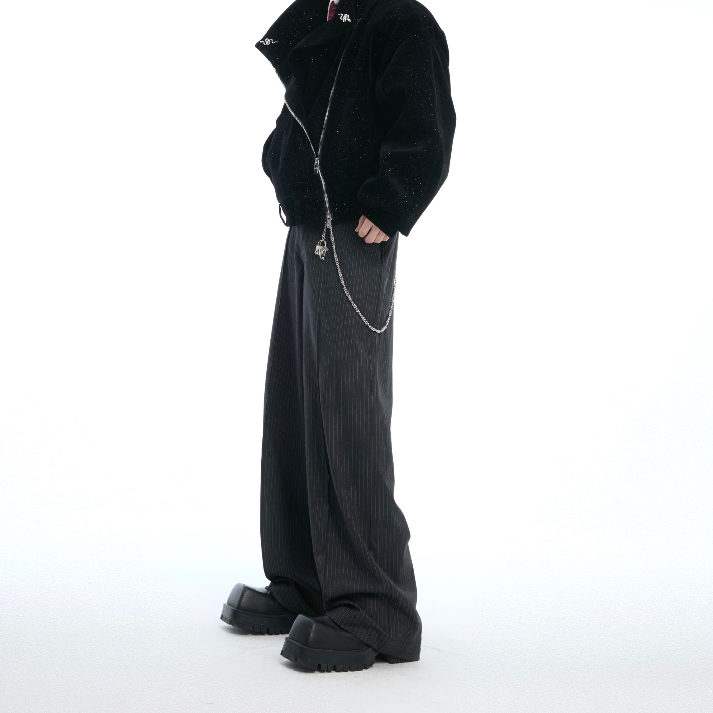 Front view of comfortable loose-fit striped trousers with metallic stripe pattern and contemporary design
