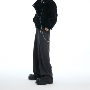 Front view of comfortable loose-fit striped trousers with metallic stripe pattern and contemporary design