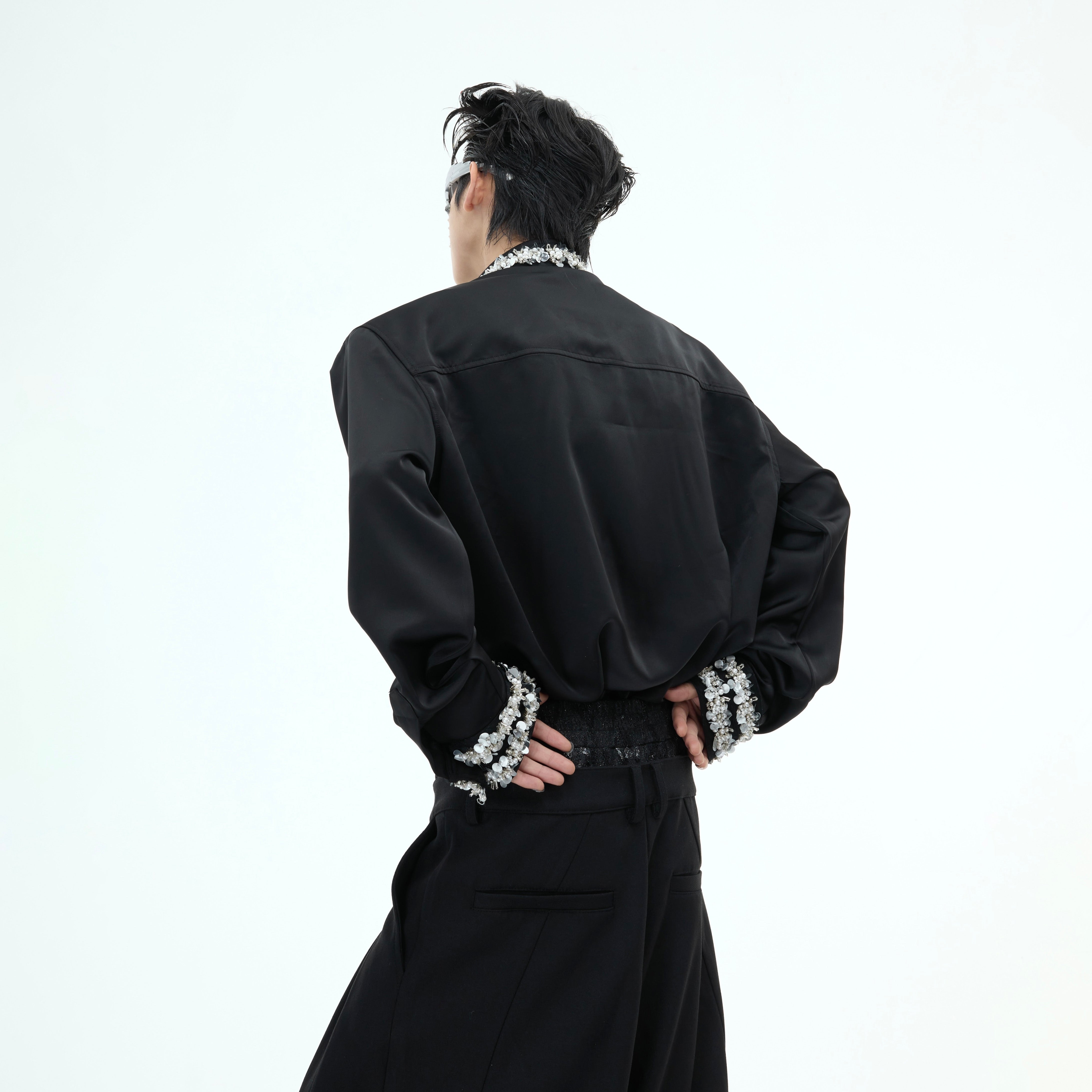 Model wearing diamond-trimmed satin shirt with detachable pads, demonstrating the perfect structured fit