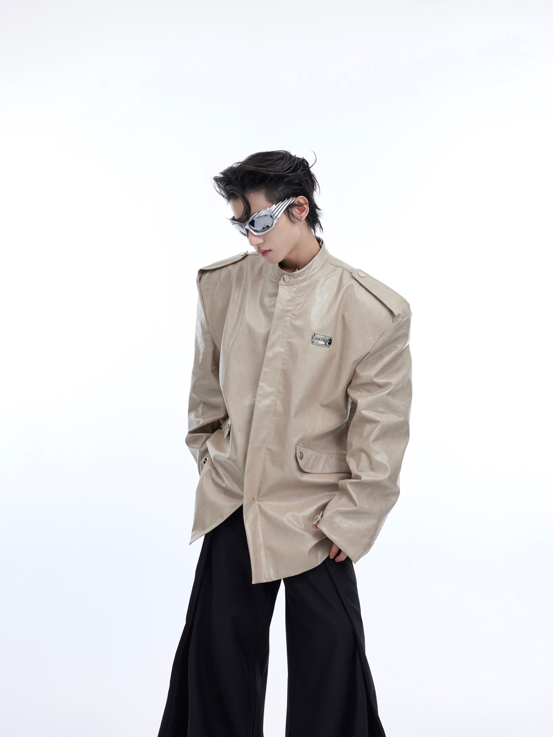 Close-up detail of the structured shoulder pads on this premium PU leather blazer for men