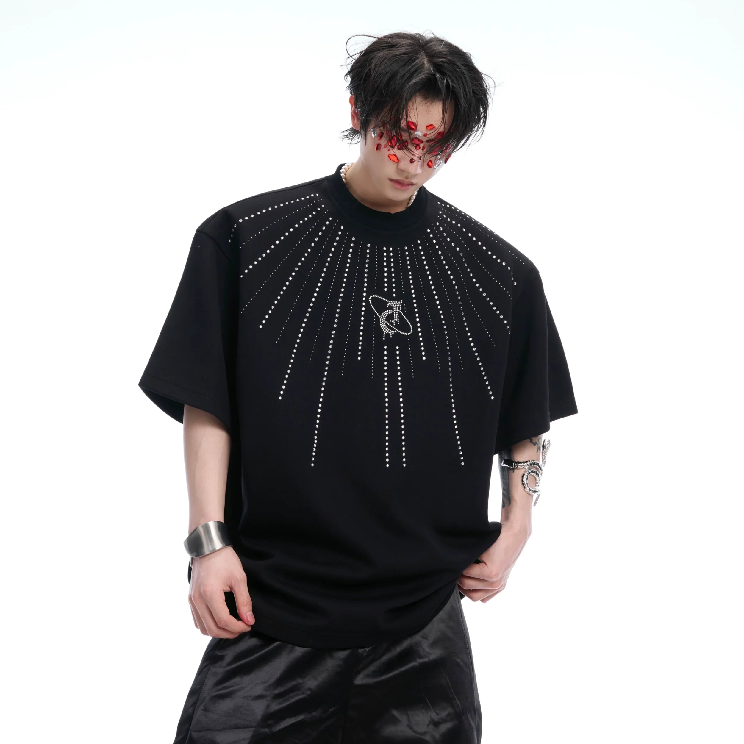 Front view of men's oversized graphic tee featuring striking diamond star print with metallic accents