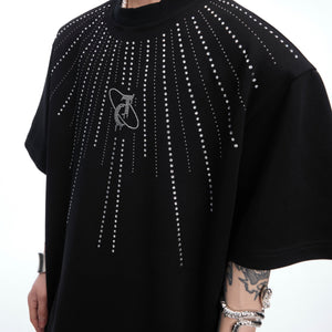 Detail shot highlighting the premium cotton blend fabric of the oversized graphic tee