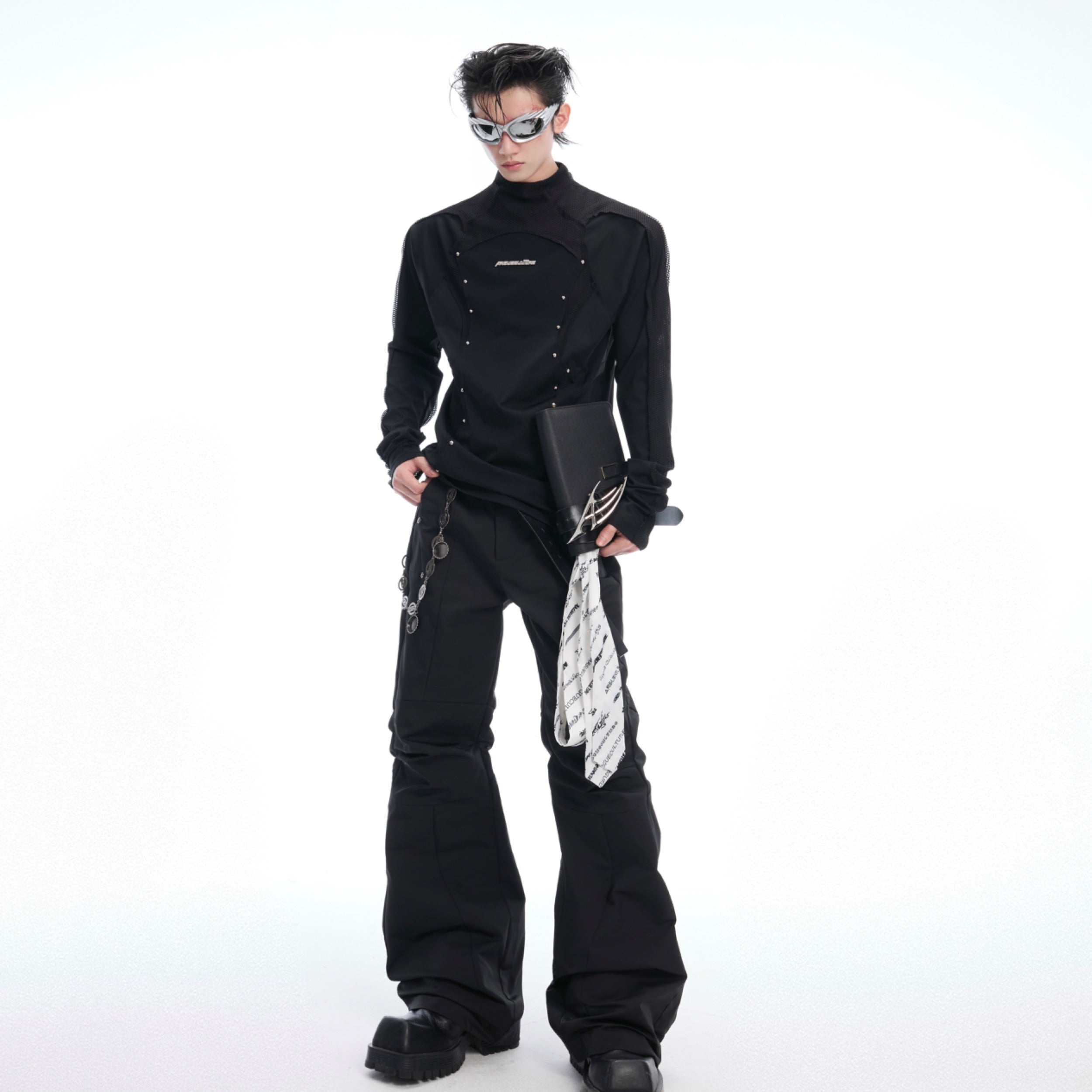 Lay-flat view of high-neck long sleeve mesh top showing deconstructed panels and modern silhouette