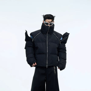 Front view of short puffer jacket with bold metal zipper detailing, showcasing urban streetwear style