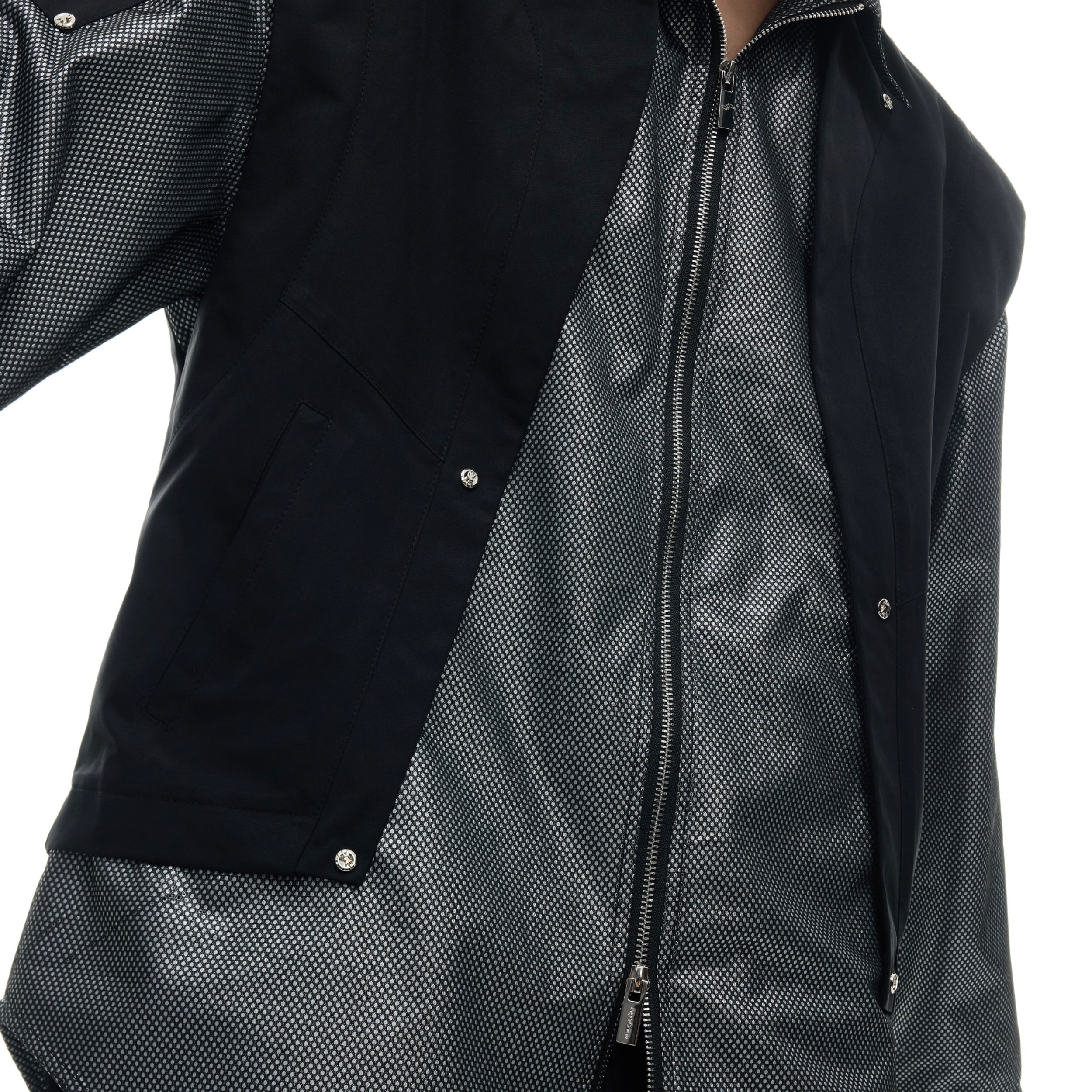 Side profile of contemporary mesh jacket showing unique deconstructed streetwear design