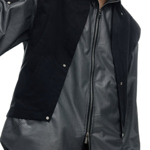 Side profile of contemporary mesh jacket showing unique deconstructed streetwear design