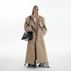 Back view of statement-making long jacket with contemporary edge and powerful silhouette