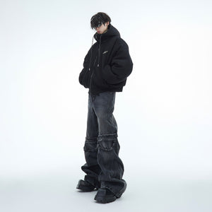 Front view of men's military camo jacket being modeled, highlighting oversized streetwear silhouette