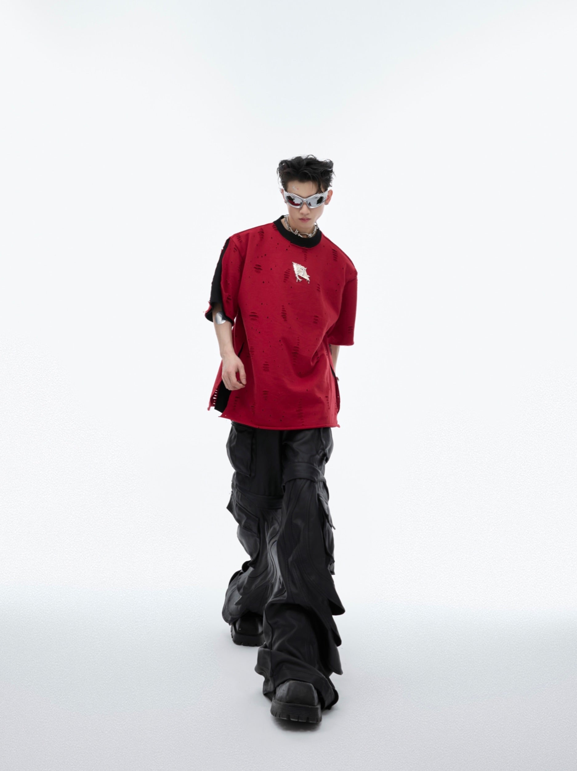 Back view of deconstructed minimalist t-shirt showcasing the avant-garde streetwear design elements