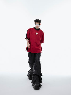 Back view of deconstructed minimalist t-shirt showcasing the avant-garde streetwear design elements