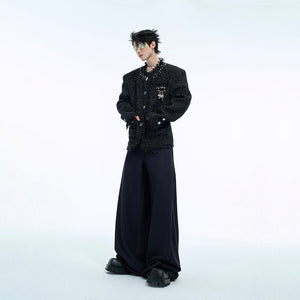 Fashion model wearing the pearl-trimmed jacket styled with urban streetwear outfit