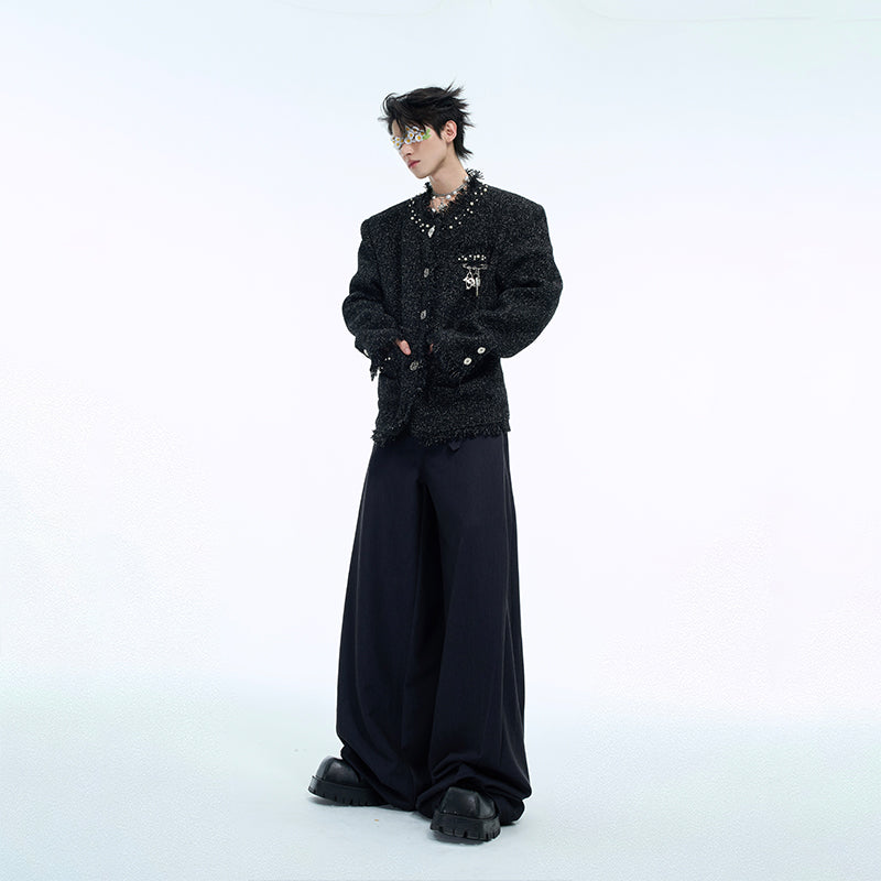 Fashion model wearing the pearl-trimmed jacket styled with urban streetwear outfit