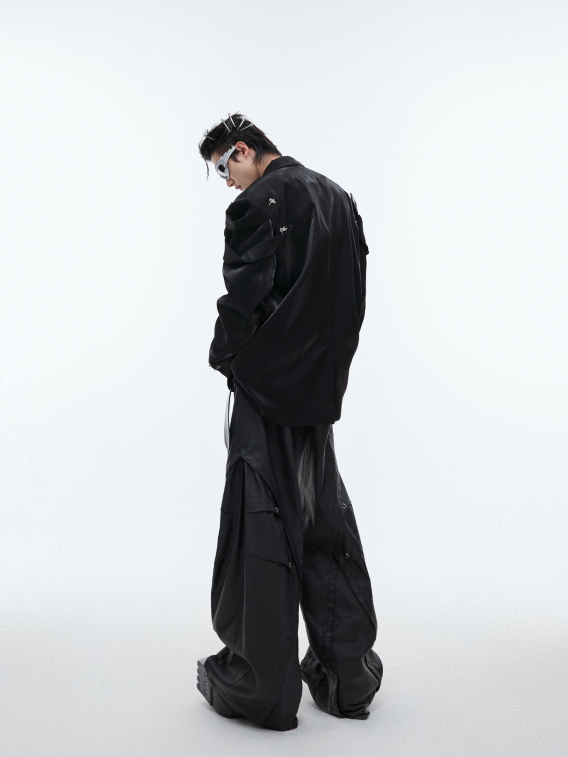 Detail shot showing unique pocket design on this deconstructed mens suit jacket