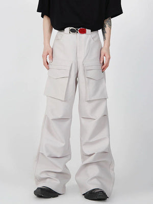 Front view of oversized cargo pants with patch pockets and drop-crotch design, perfect for urban streetwear style