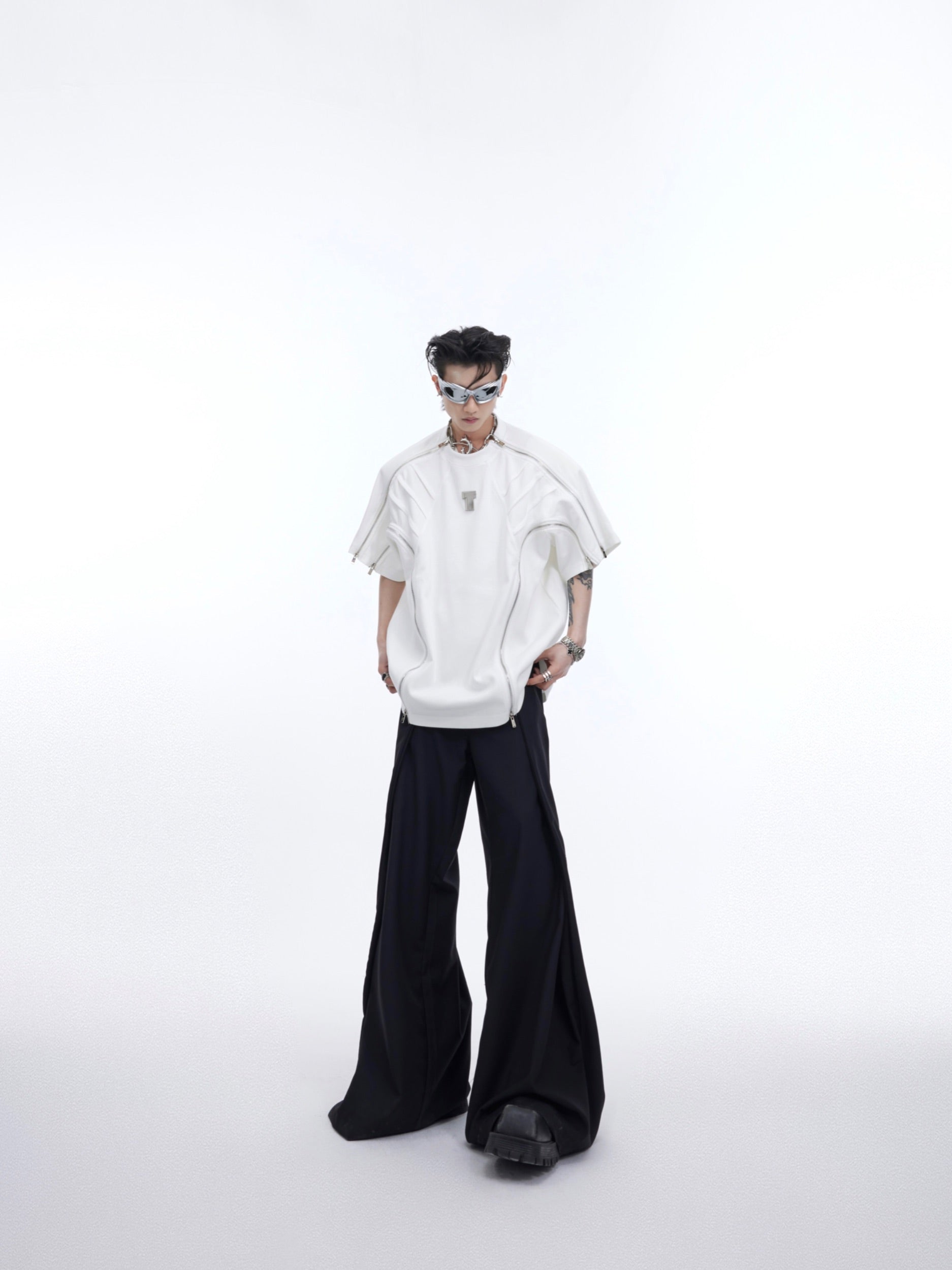 Streetwear model wearing the oversized deconstructed tee, highlighting the relaxed fit and textured fabric quality